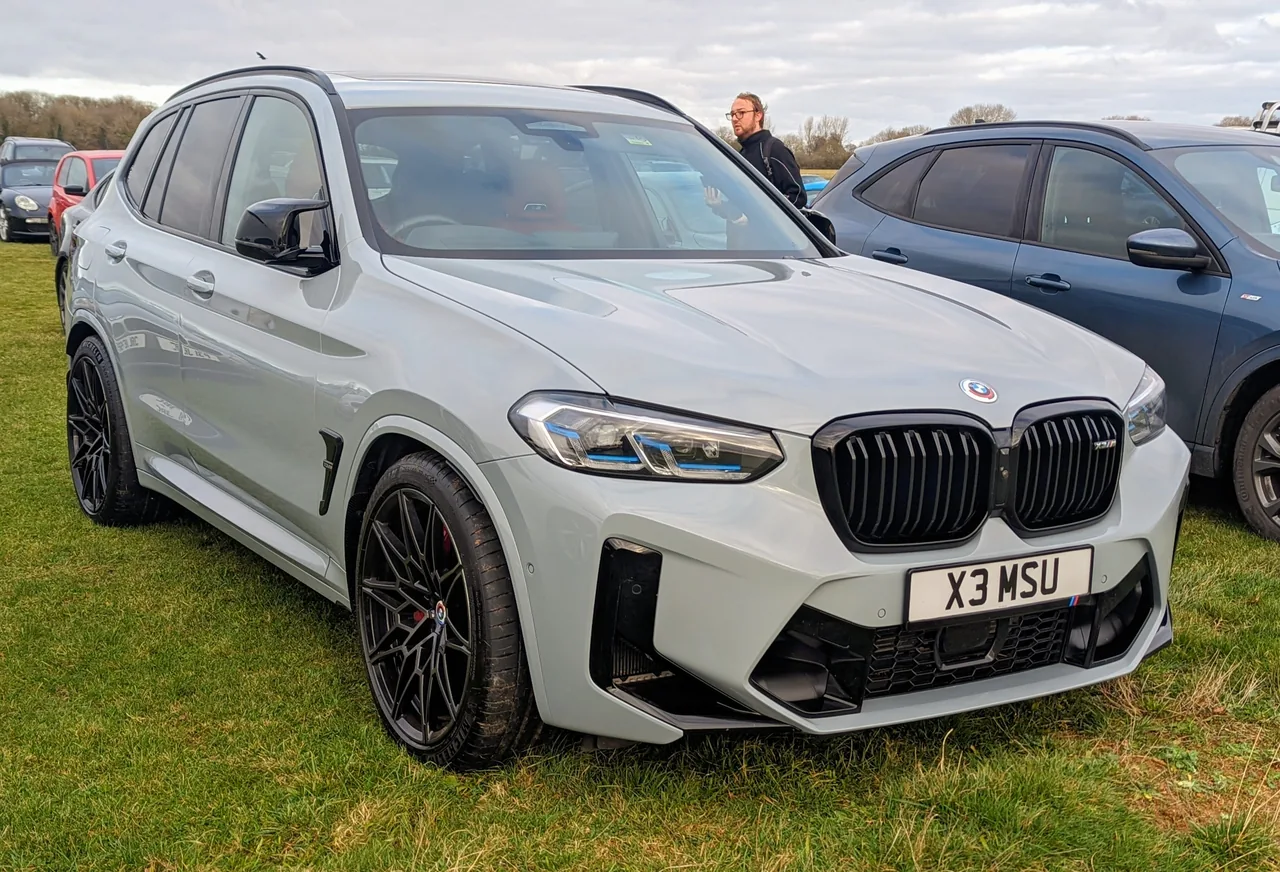 White BMW X3 M Competition at a car gathering in England